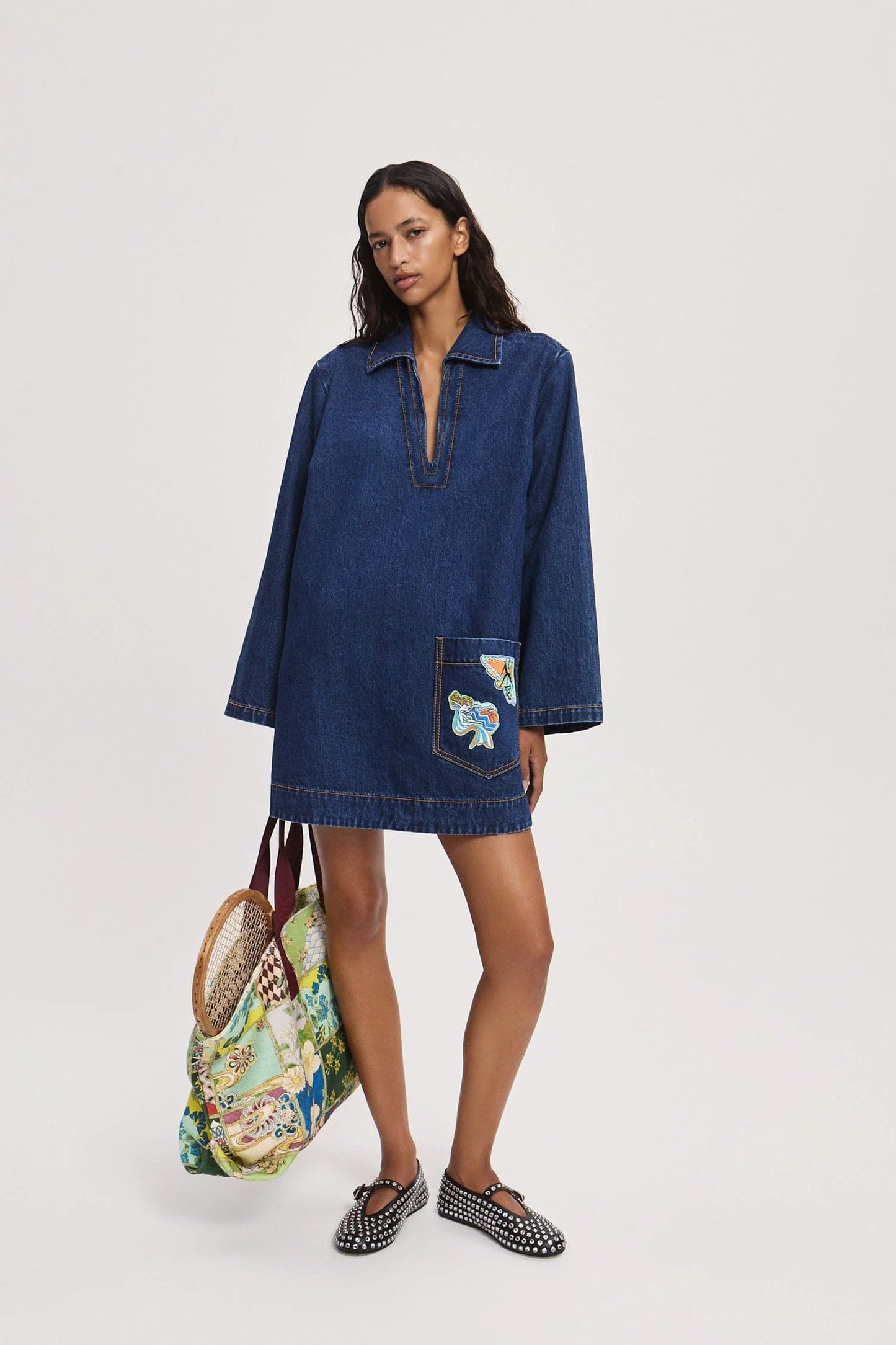 Front view of Speedy embroidered cotton denim mini dress by Alémais