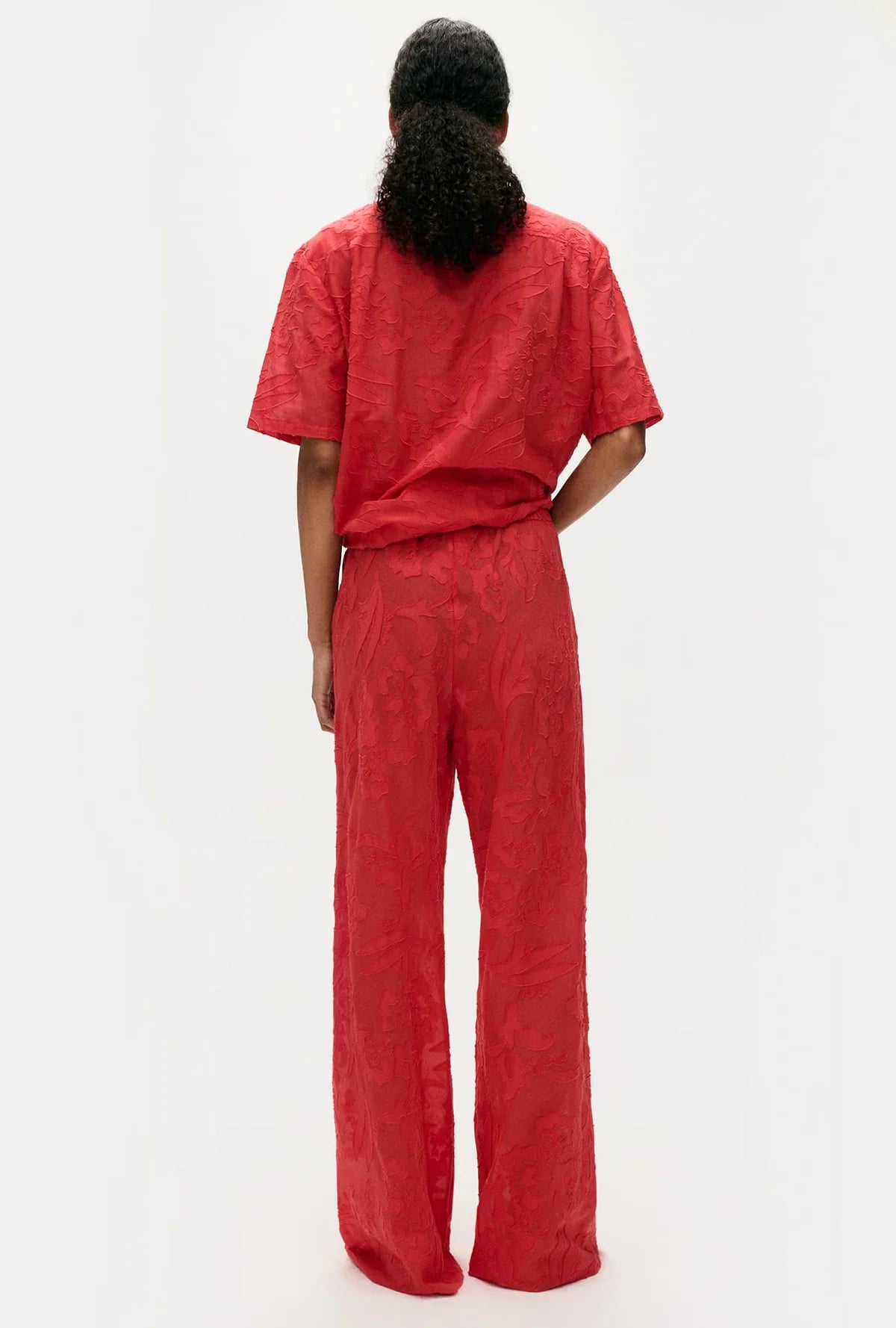 Back view of Clip Silk Bias Cut Pant in Geranium by Silk Laundry